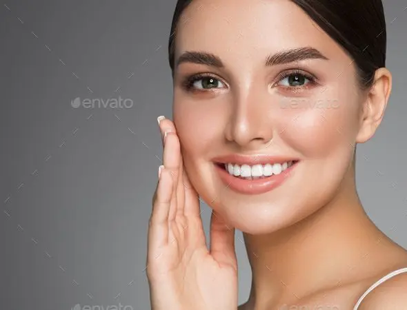 Preventive Dental Care Smile Gallery Woman with healthy white teeth smiling